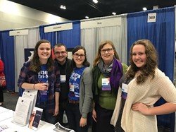 Students Staffing a Booth at the ILMEA All-State Conference