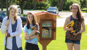 Girl Scouts Donate Little Free Library to WAS