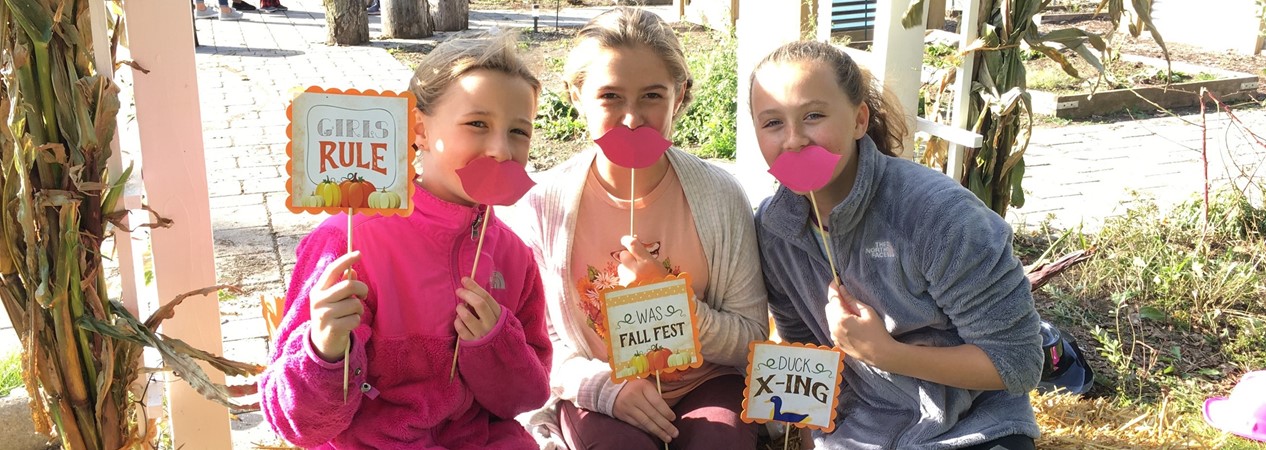 Three girls at fall fest