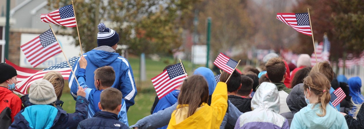 Students Raise American Flags