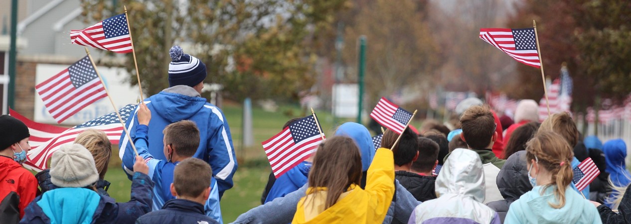 Students Raise American Flags